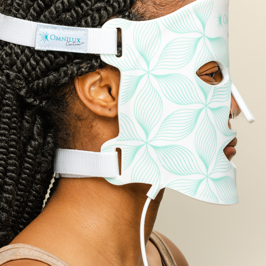 Side view of omnilux contour mask on womans face