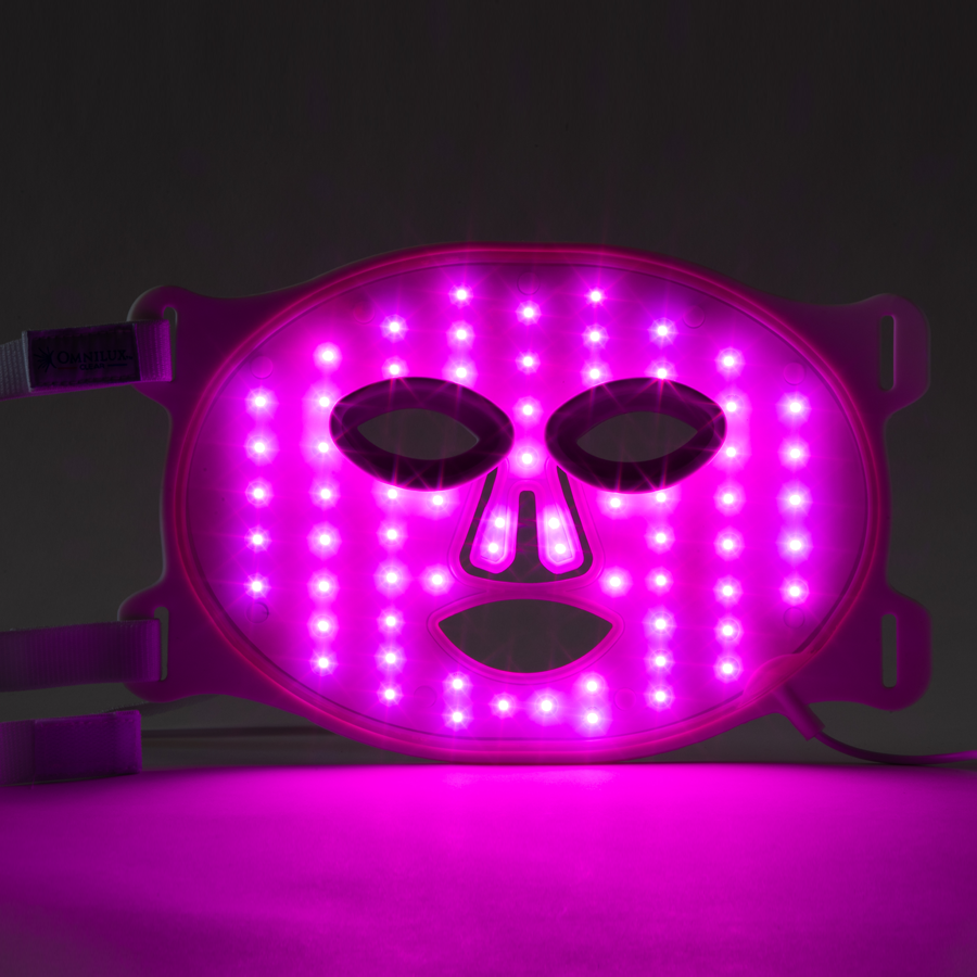 Inside of omnilux clear light therapy mask with lights on