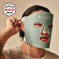 Man wearing omnilux men's mask with 2023 grooming award icon from Men's Health