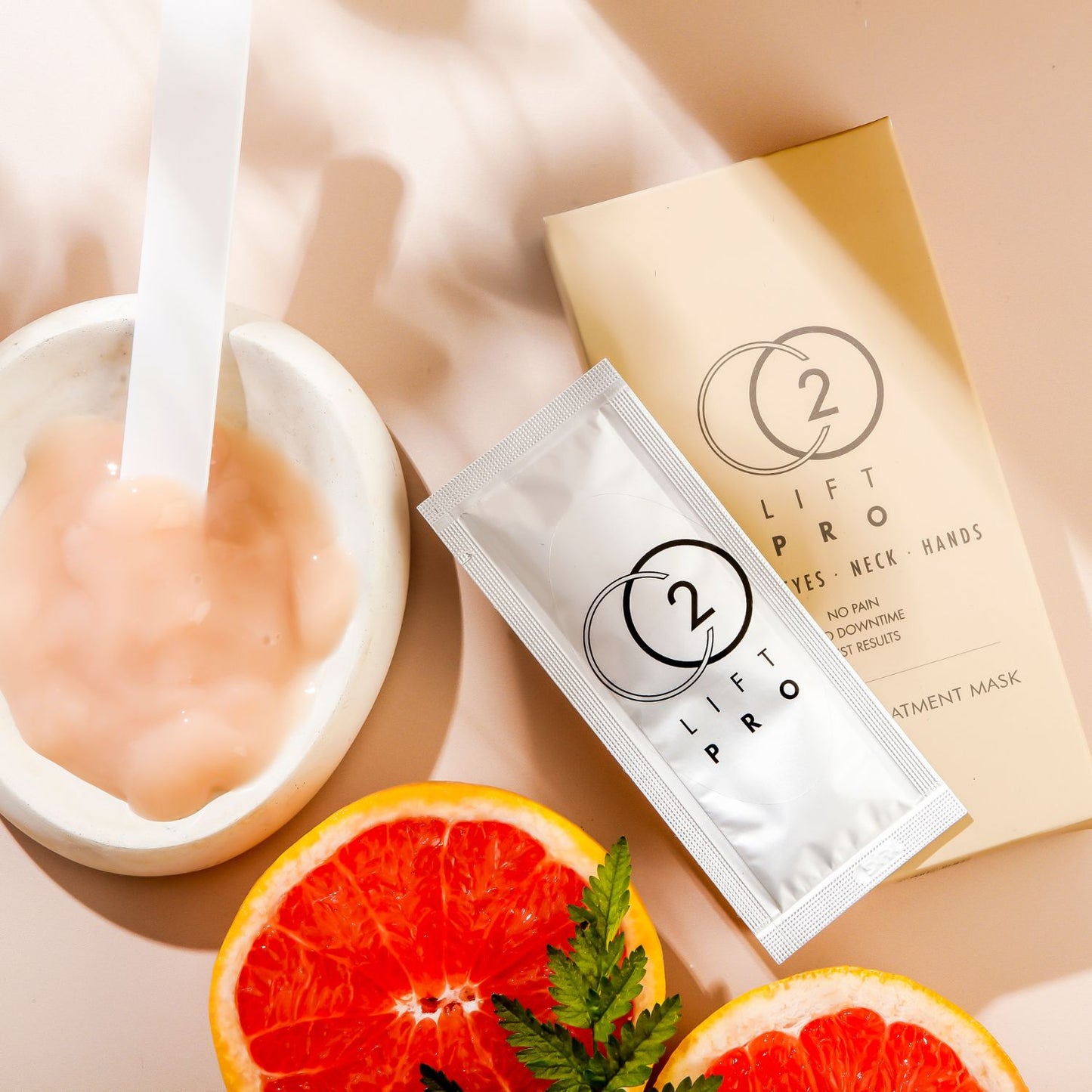 co2pro face lift lifestyle imagery with grapefruit - The Skin Clinic LA