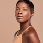 black woman wearing face shield bronzer spf 50